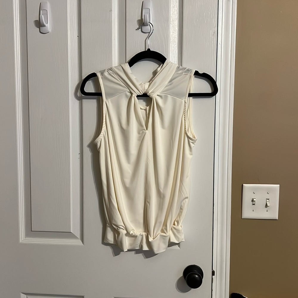 Business casual cream buckle brand top.